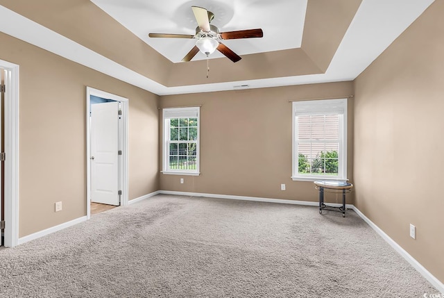206 Balsa Dr, Longs, SC 29568 - unfurnished bedroom featuring a raised ceiling, carpet floors, and ceiling fan