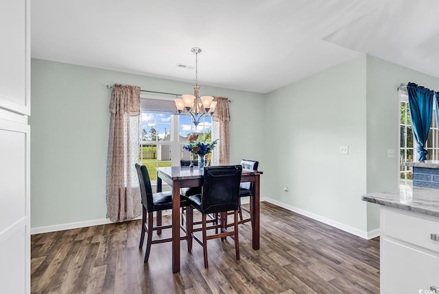 206 Balsa Dr, Longs, SC 29568 - dining area with a chandelier and dark wood-style flooring
