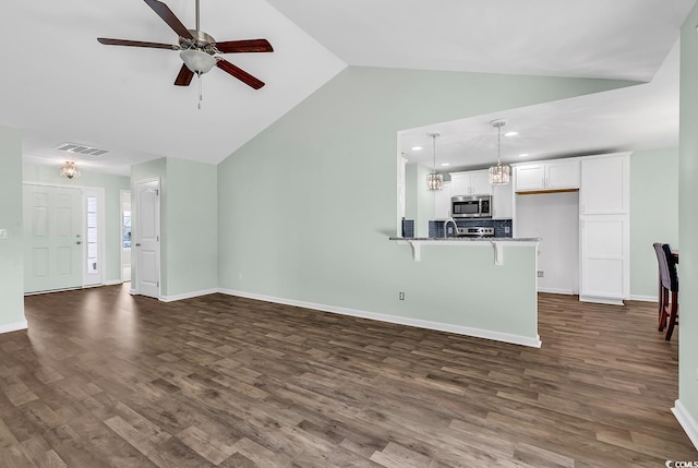 206 Balsa Dr, Longs, SC 29568 - unfurnished living room featuring lofted ceiling, ceiling fan, dark wood-style floors, and recessed lighting