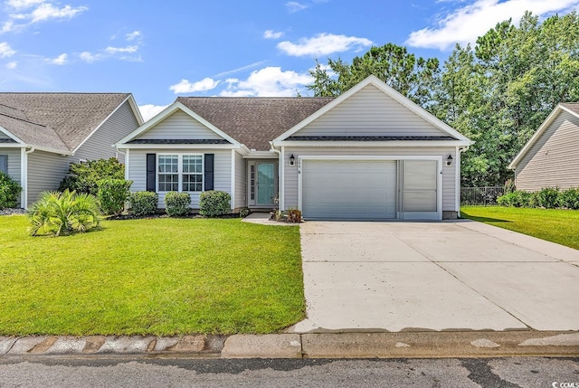 206 Balsa Dr, Longs, SC 29568 - view of front of home with concrete driveway, an attached garage, and roof with shingles