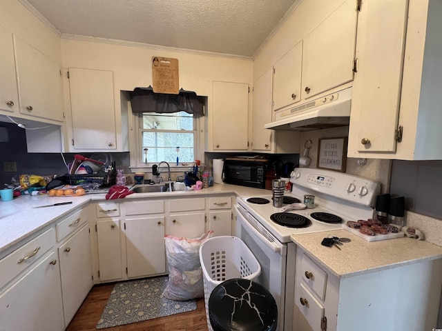 kitchen with electric stove, a textured ceiling, under cabinet range hood, black microwave, and a sink