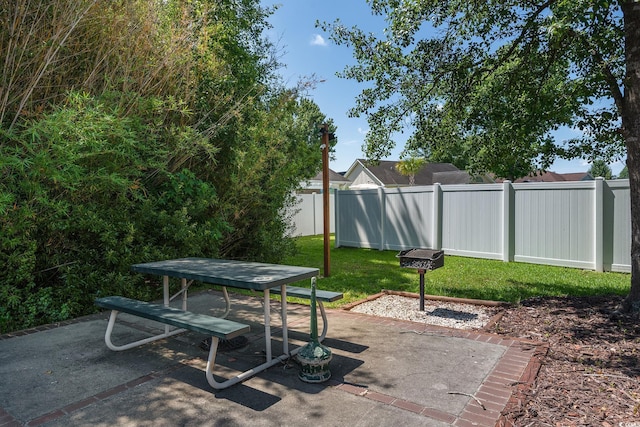 view of patio / terrace featuring fence