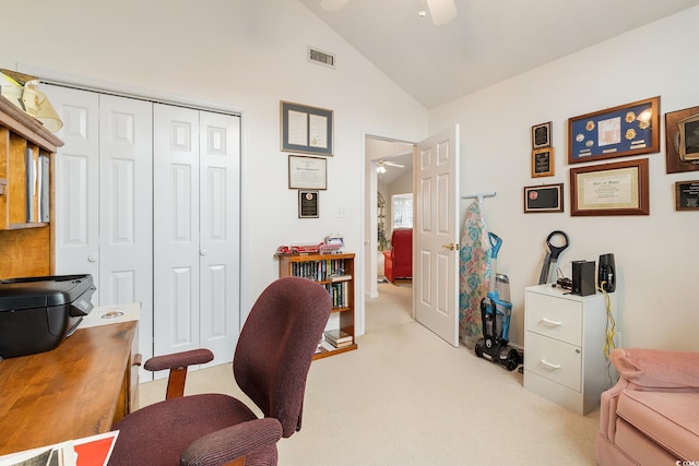 home office with a ceiling fan, lofted ceiling, visible vents, and carpet flooring