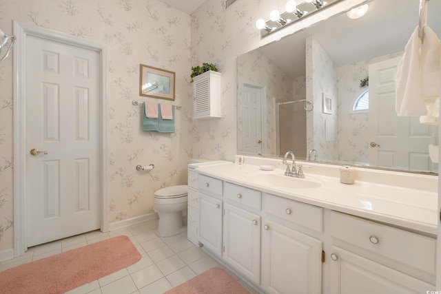 bathroom featuring wallpapered walls, a stall shower, vanity, baseboards, and tile patterned floors