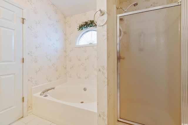 full bathroom featuring a garden tub, tile patterned flooring, a shower stall, and wallpapered walls