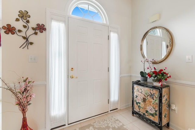 entryway featuring light tile patterned flooring