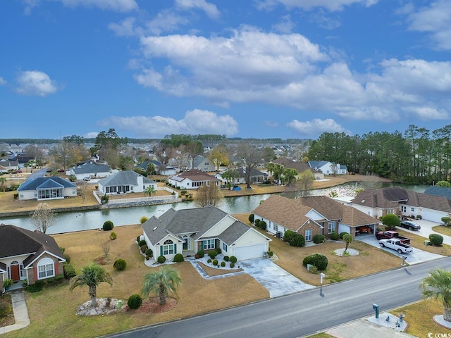 aerial view with a water view and a residential view