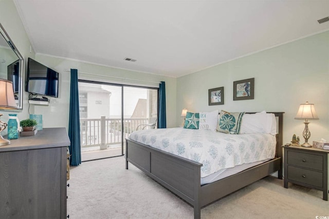 bedroom with light carpet, visible vents, and access to outside