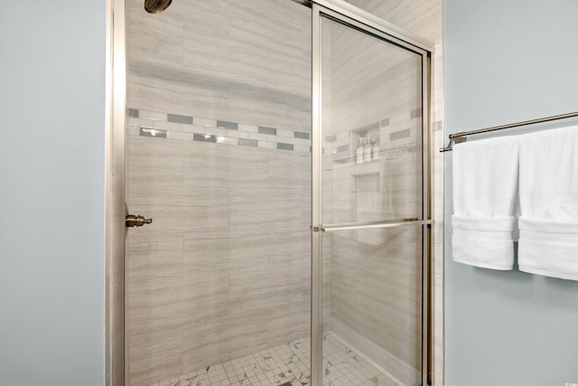 bathroom featuring a shower stall