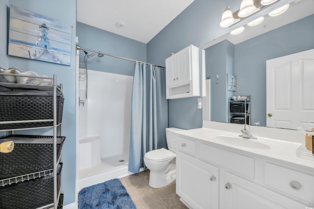 full bath with a shower with curtain, vanity, toilet, and tile patterned floors