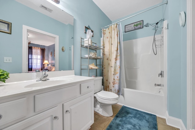 full bathroom featuring shower / bath combination with curtain, visible vents, toilet, vanity, and tile patterned floors