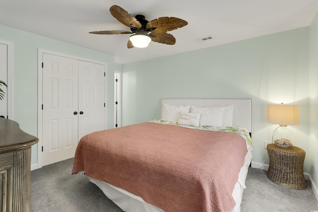 bedroom featuring carpet, visible vents, a closet, and ceiling fan