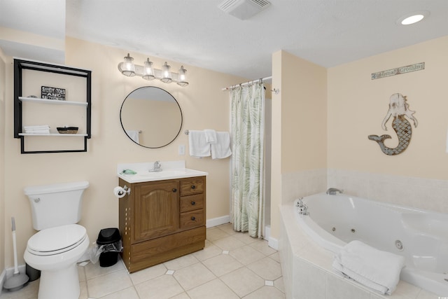 bathroom featuring tile patterned floors, visible vents, toilet, a jetted tub, and vanity