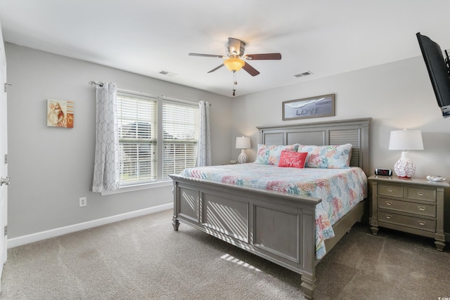 bedroom featuring ceiling fan, carpet floors, visible vents, and baseboards