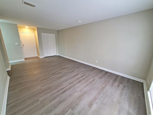 6840 Blue Heron Blvd Unit 108, Myrtle Beach, SC 29588 - empty room with wood finished floors