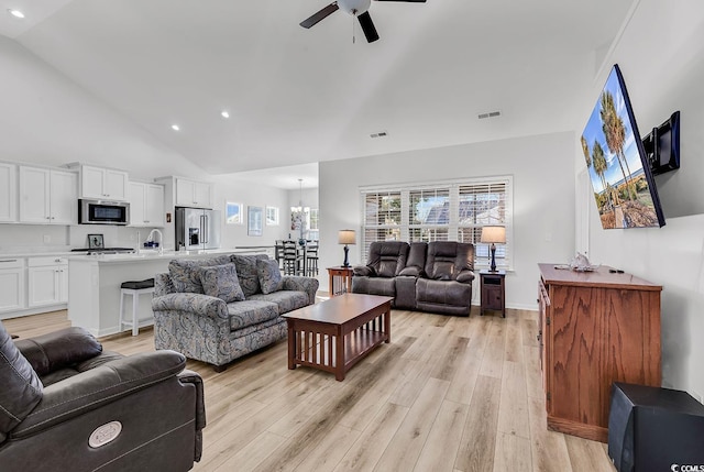 living room featuring recessed lighting, visible vents, ceiling fan, and light wood-style flooring