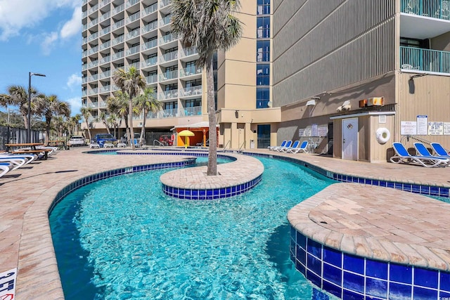 community pool featuring a patio