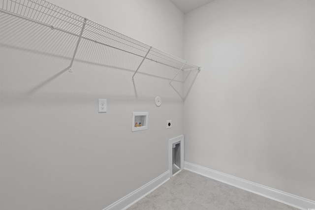 1204 NW Calabash Station Blvd, Calabash, NC 28467 - washroom with laundry area, electric dryer hookup, gas dryer hookup, washer hookup, and baseboards