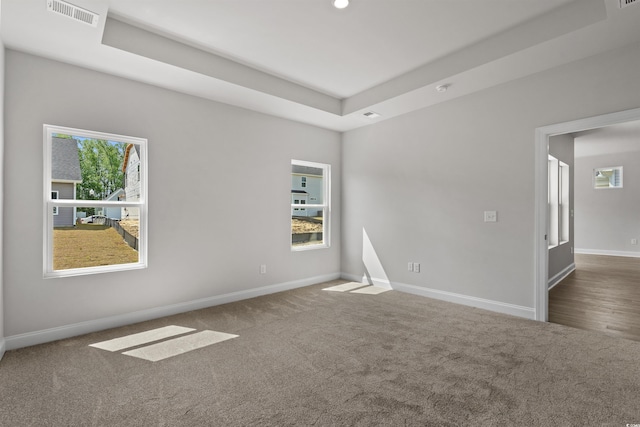 1204 NW Calabash Station Blvd, Calabash, NC 28467 - empty room with recessed lighting, a tray ceiling, visible vents, carpet, and baseboards