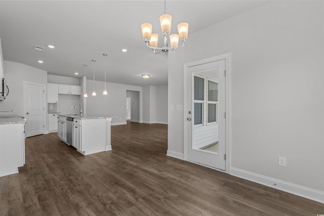 1204 NW Calabash Station Blvd, Calabash, NC 28467 - kitchen featuring pendant lighting, white cabinetry, stainless steel dishwasher, a sink, and a chandelier