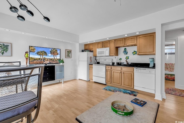 kitchen featuring baseboards, white appliances, light wood-style flooring, and recessed lighting