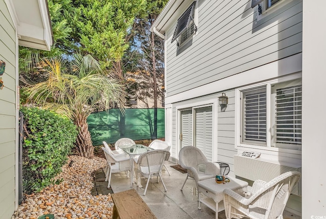 view of patio featuring outdoor dining area