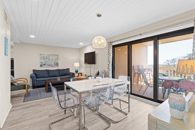 dining space with recessed lighting, visible vents, light wood-style flooring, and wooden ceiling