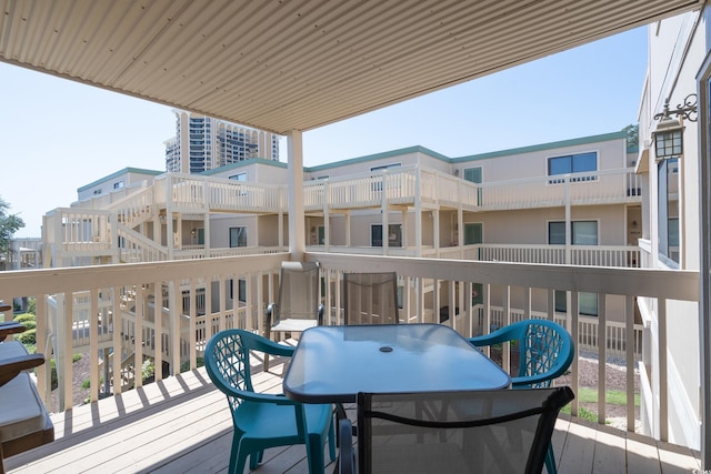 balcony featuring outdoor dining area