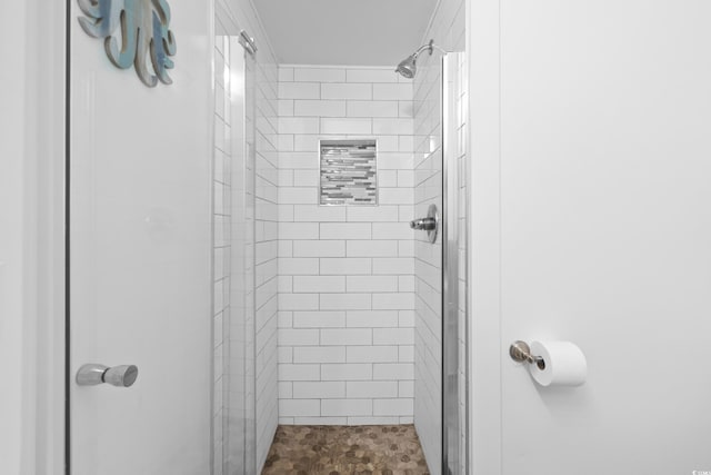 bathroom with a stall shower