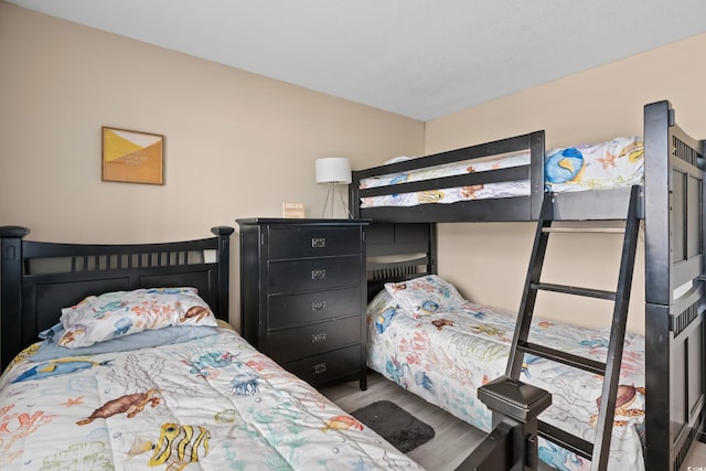 bedroom featuring wood finished floors