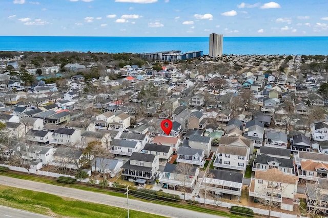 aerial view featuring a water view and a residential view