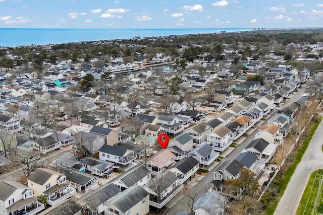 aerial view with a water view and a residential view