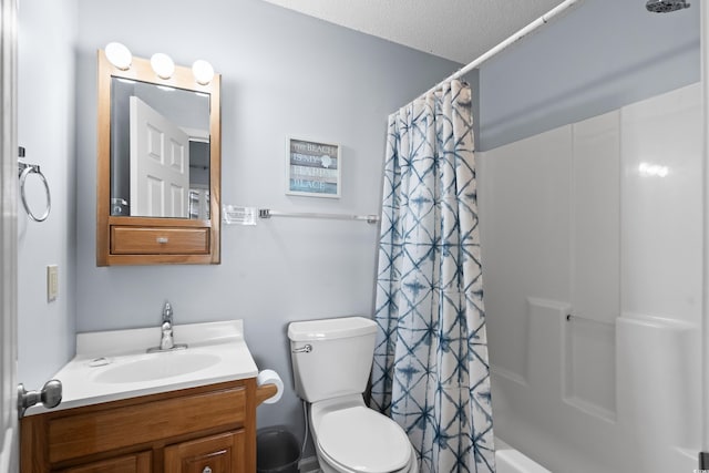 full bath featuring a textured ceiling, shower / tub combo, vanity, and toilet