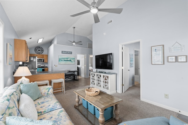 living area featuring carpet, visible vents, a ceiling fan, high vaulted ceiling, and baseboards