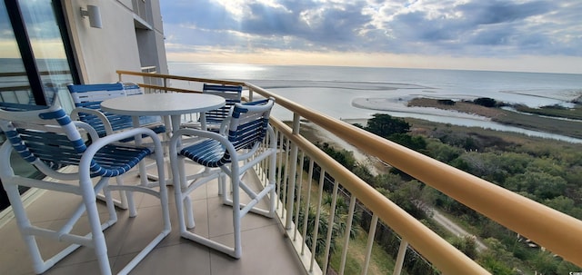 balcony featuring a water view