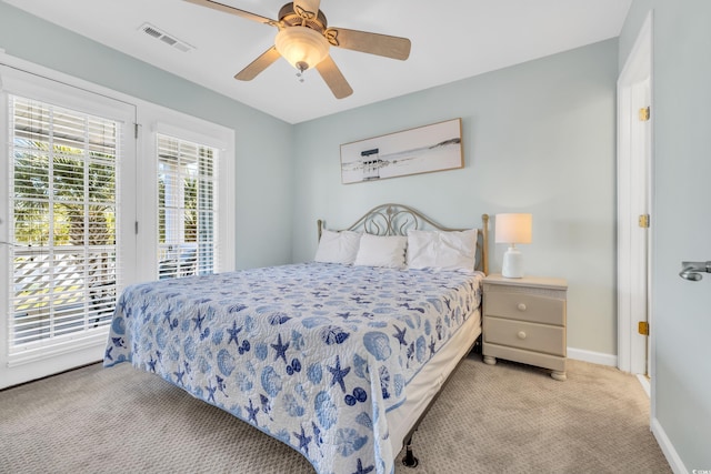 bedroom with baseboards, visible vents, a ceiling fan, access to exterior, and carpet flooring