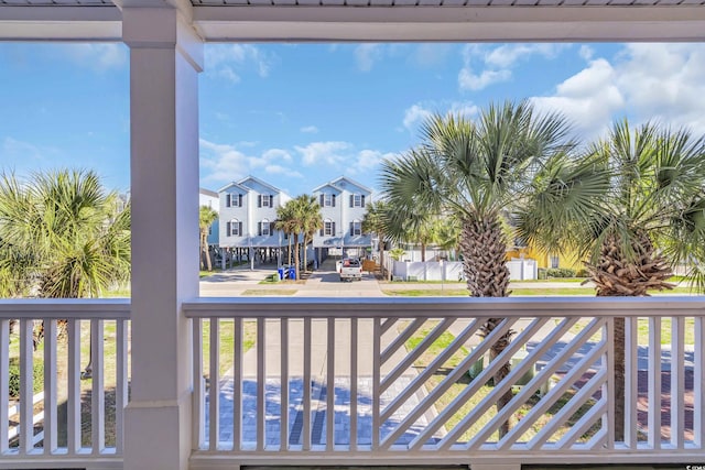 balcony featuring a residential view