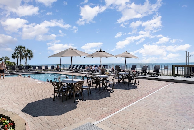 community pool featuring a patio