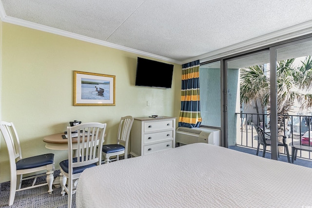 bedroom with ornamental molding, access to outside, a wall mounted air conditioner, and a textured ceiling