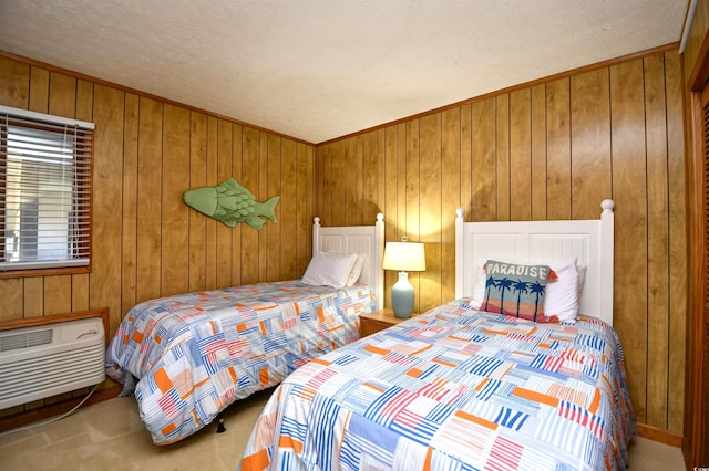 carpeted bedroom featuring a wall mounted air conditioner and wood walls