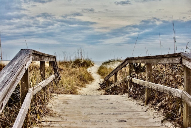 55 Porch Ln, Pawleys Island, SC 29585 - surrounding community with a beach view