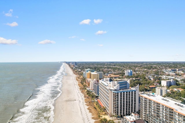 aerial view with a city view, a beach view, and a water view