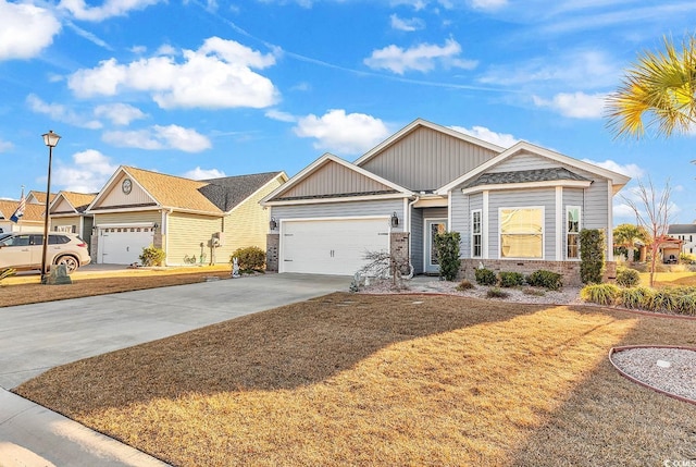 ranch-style home featuring driveway, a garage, and a front yard