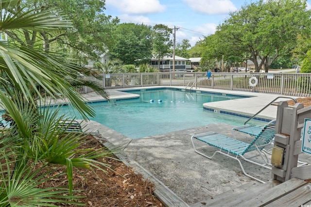 310 5th Ave N Unit 206, Surfside Beach, SC 29575 - community pool featuring a patio