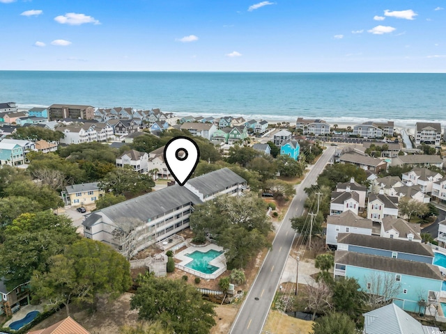 drone / aerial view featuring a water view and a residential view