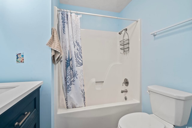 bathroom featuring shower / bathtub combination with curtain, toilet, and vanity