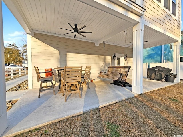 view of patio / terrace featuring ceiling fan, outdoor dining space, grilling area, and fence