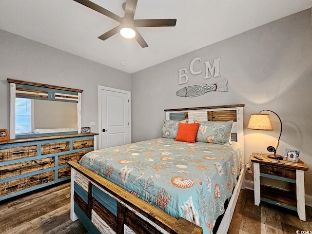 bedroom with a ceiling fan and wood finished floors