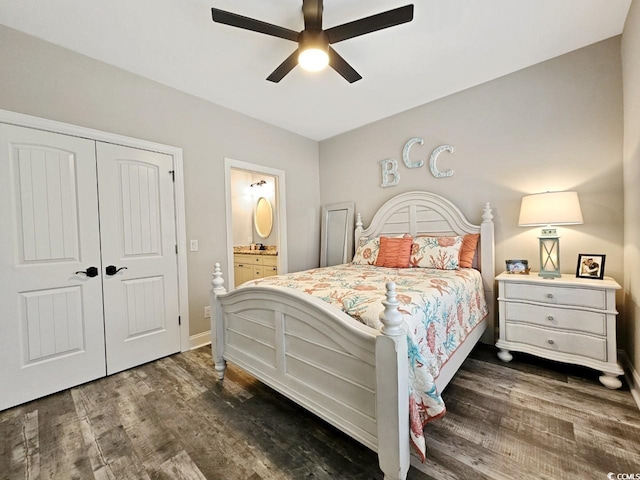 bedroom with connected bathroom, a ceiling fan, baseboards, a closet, and dark wood finished floors