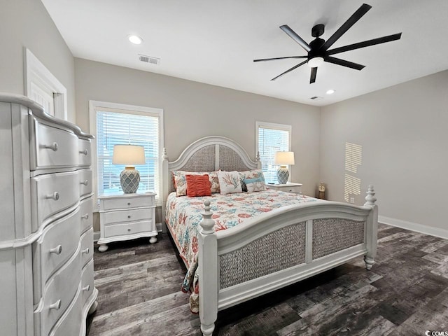 bedroom with baseboards, visible vents, dark wood finished floors, a ceiling fan, and recessed lighting